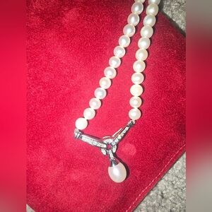 Elegant Pearl Necklace with Diamond Accents in 14K White Gold.